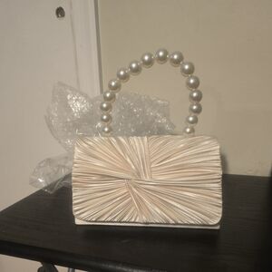 Elegant Cream Handbag with Pearl Handle
